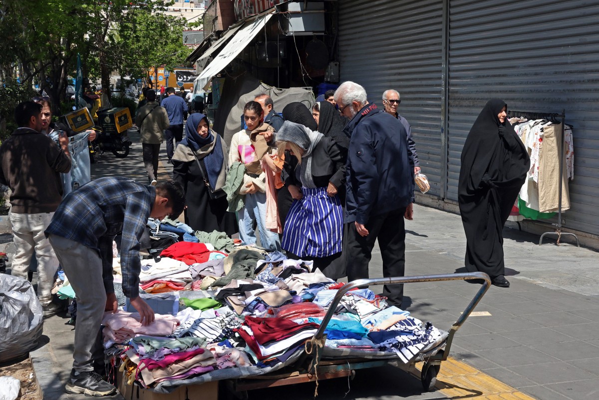 Fire at a shopping center in Iran kills 8 people and injures 36