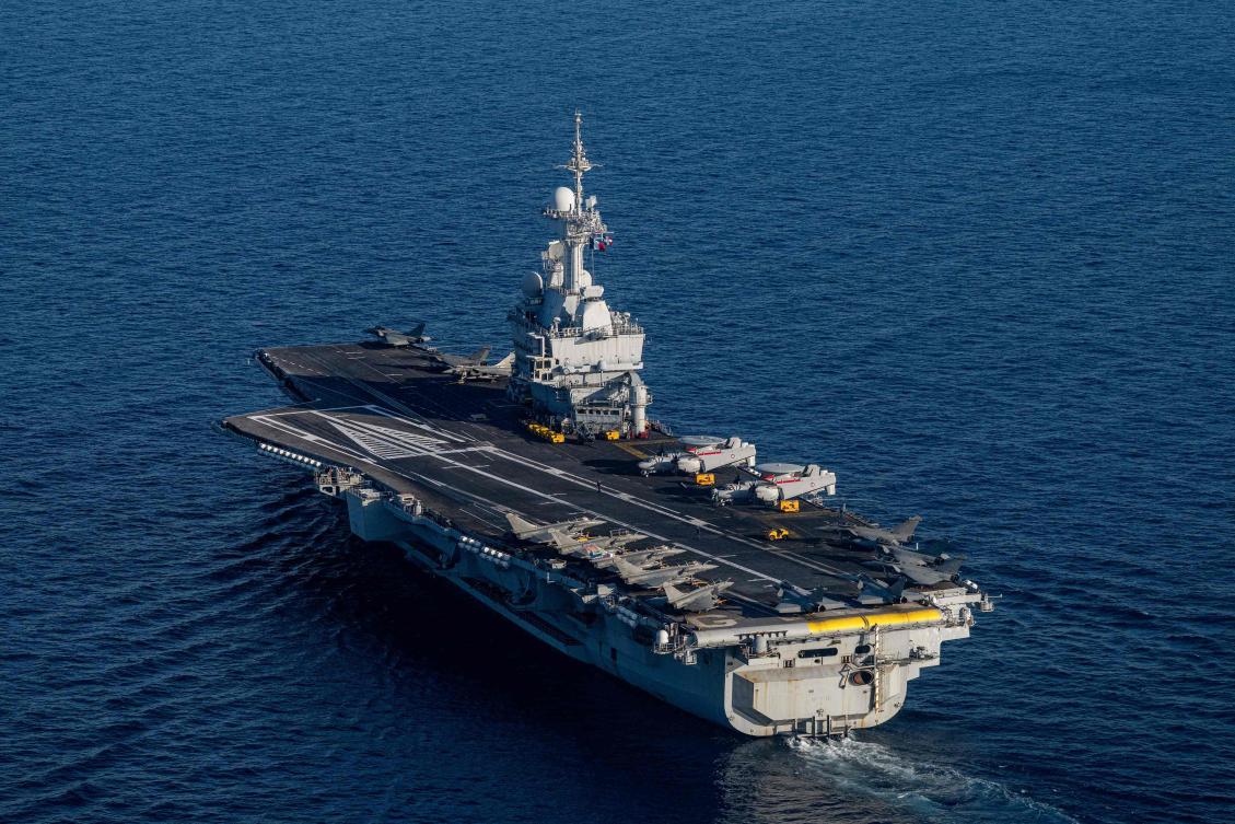 This photograph shows an aerial view of the French aircraft carrier Charles de Gaulle at the end of the NATO military exercise Neptune Strike 26-2, off the coast of the Greek island of Crete. (File/AFP)
