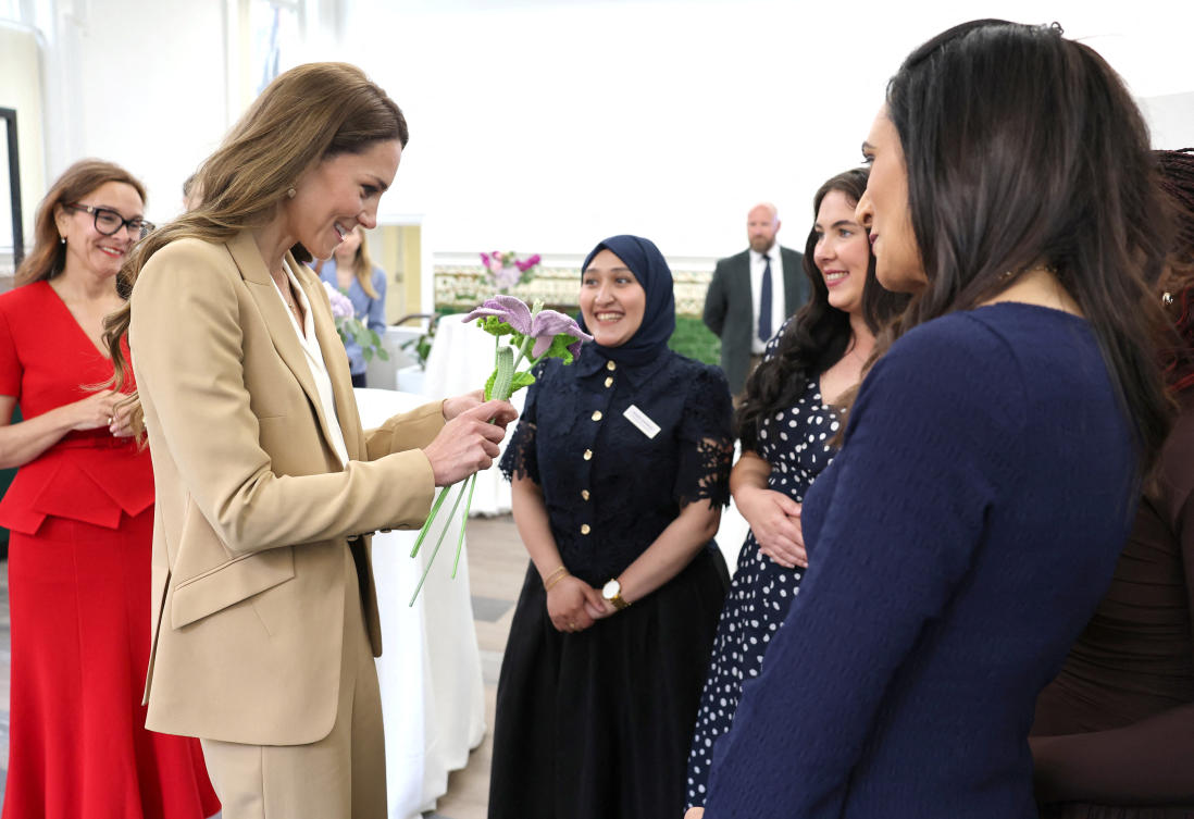 Britain's Catherine, Princess of Wales, reacts as she receives a gift during her visit for the launch of "Foundations for Life: A Guide to Social and Emotional Development", at the University of East London, in London, Britain, May 6, 2026. (Reuters)