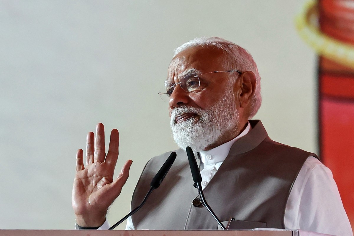 India’s Prime Minister Narendra Modi gestures as he addresses a public meeting for women in Varanasi, India. (AFP)