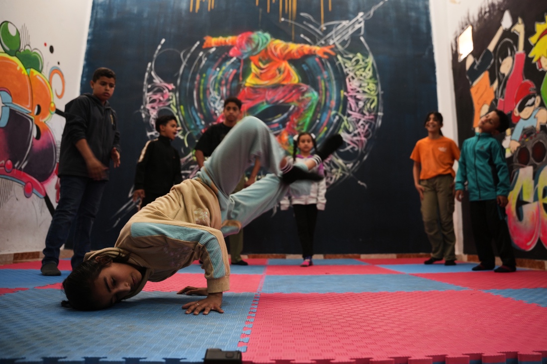 Palestinian children practice breakdancing in a dance studio in Nuseirat, central Gaza Strip. (AP)