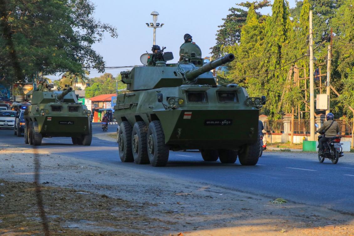 Myanmar’s military claimed Thursday to have recaptured a key northern transport corridor toward China. Above, soldiers ride in armored vehicles in Myitkyina, Kachin state on Feb. 3, 2021. (AFP file photo)