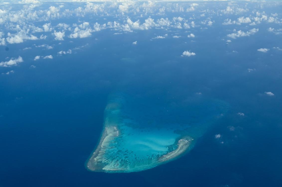Philippines warns Chinese research ship in disputed waters