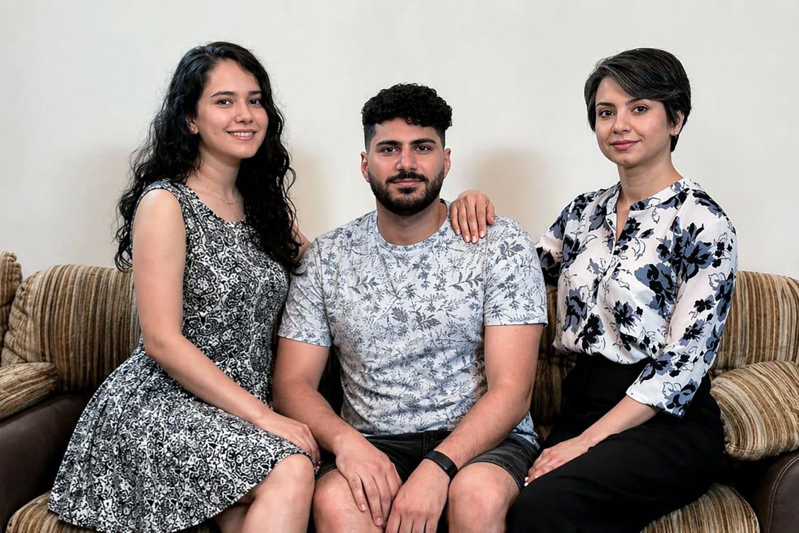 This family handout photo released on May 7, 2026, and taken in March 2025, shows Mahsa Sotoudeh (L), Behzad Basiri (C) and Mandana Sotoudeh (R), who are of the Bahai faith, posing in Shiraz. (AFP)