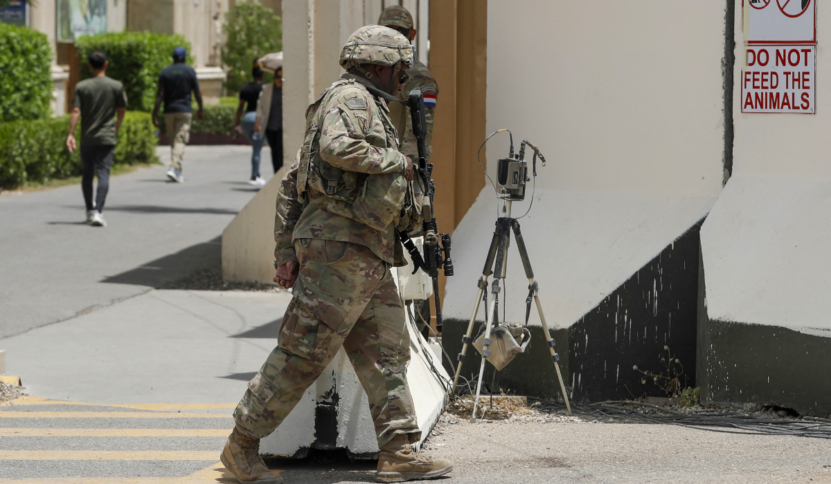 US and French soldiers stand guard at Union III Camp in the Green Zone of the Iraqi capital Baghdad. (AFP file photo)