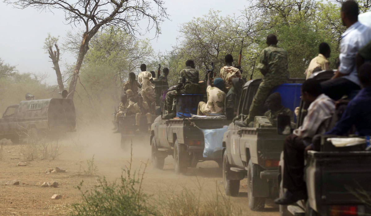 Sudanese soldiers patrol the Daldako area, about 20 kilometres northeast of South Kordofan's state capital Kadugli, after recapturing it from rebels on May 20, 2014. (AFP)