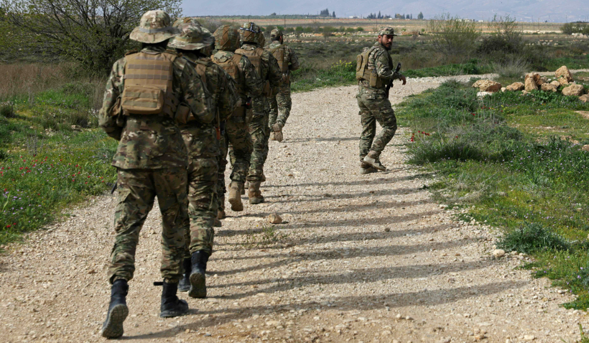 Syrian army soldiers patrol along the Syrian-Lebanese border in the rural area of Al Qusayr on April 1, 2026. (AFP)
