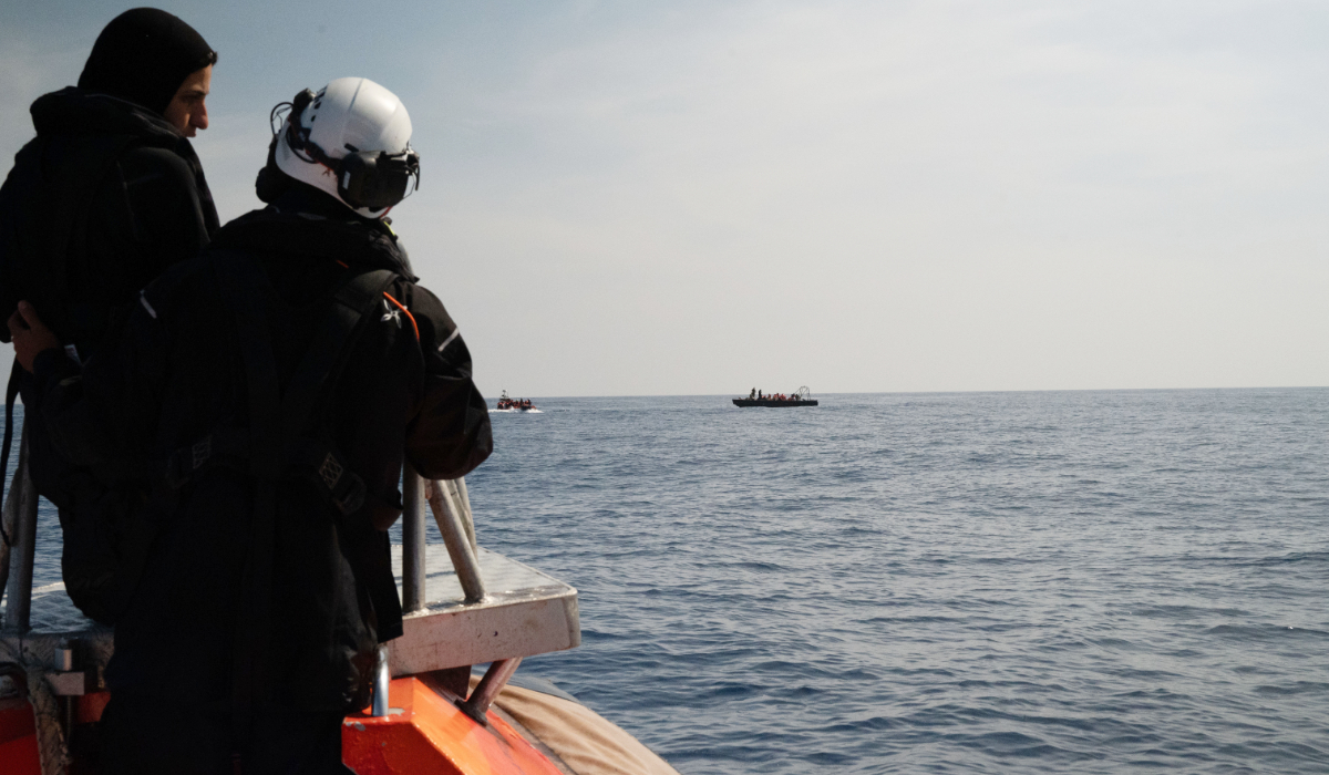 This photo released by Sea-Watch shows the crew of migrant rescue ship Sea-Watch 5 approaching a boat in distress with people on board in an area of the Mediterranean patrolled by Libyan authorities, Monday, May 11, 2026. (AP)