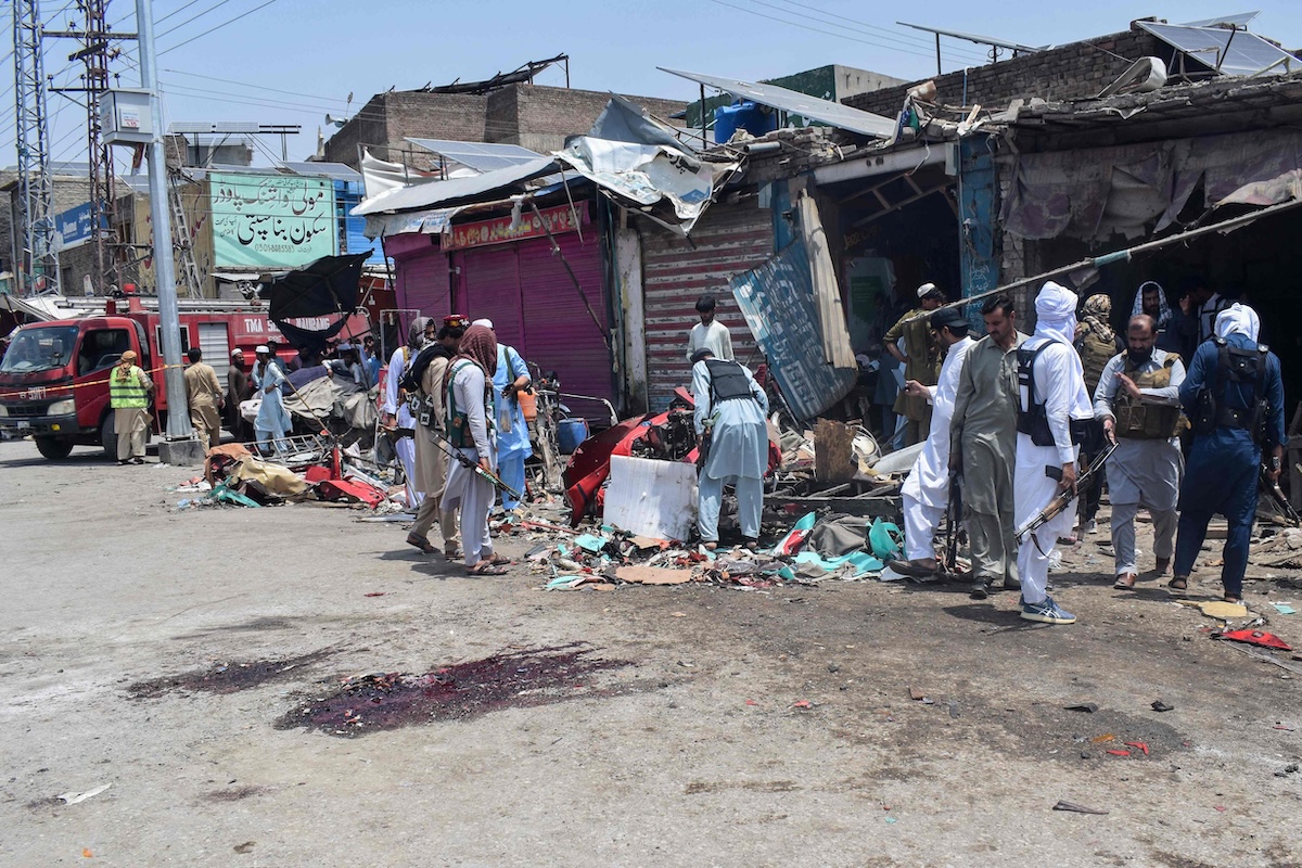 Above, security personnel inspect the blast site after a suicide attack in the Sarai Naurang area of Pakistan’s Lakki Marwat district on May 12, 2026. (AP)