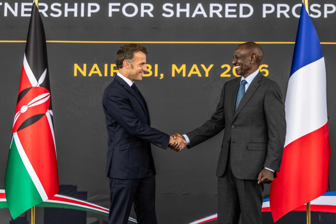 French President Emmanuel Macron (L) and Kenyan President William Ruto (R) shake hands during a reception at State House ahead of the Africa Forward: Africa- France Partnerships for Innovation and Growth Summit in Nairobi, on May 10, 2026. (AFP)