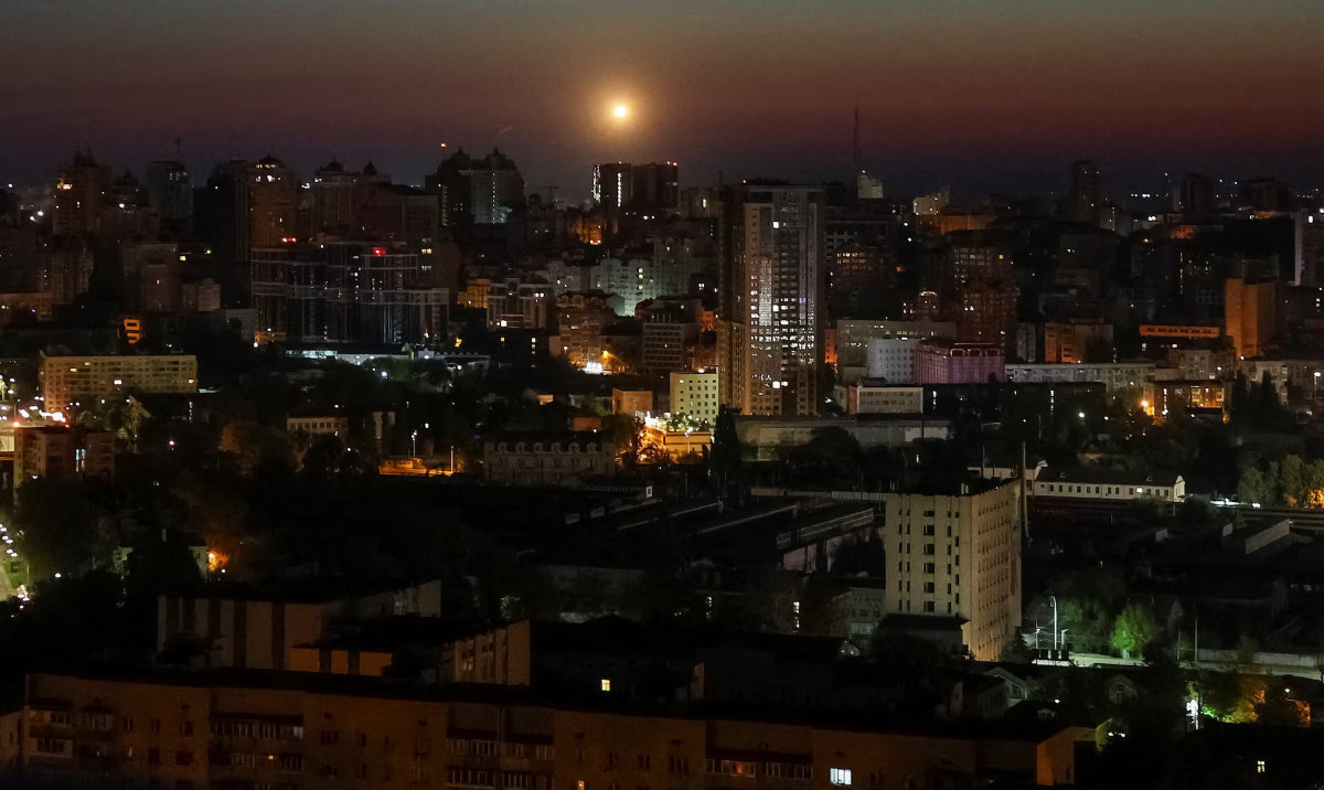 An explosion over the city as Ukrainian servicemen hit a Russian drone during a Russian drone strike, amid Russia's attack on Ukraine, in Kyiv, Ukraine May 12, 2026. (Reuters)