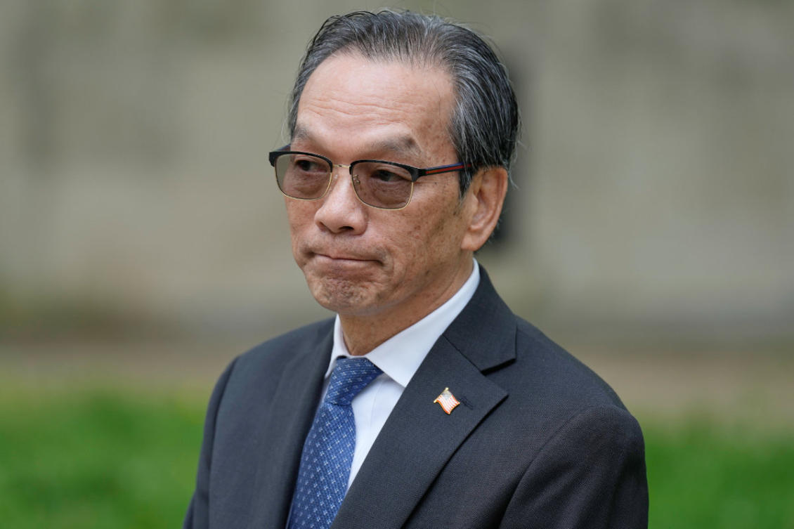 Lu Jianwang waits to enter a federal courthouse in New York, Wednesday, May 6, 2026. (AP Photo/Seth Wenig)