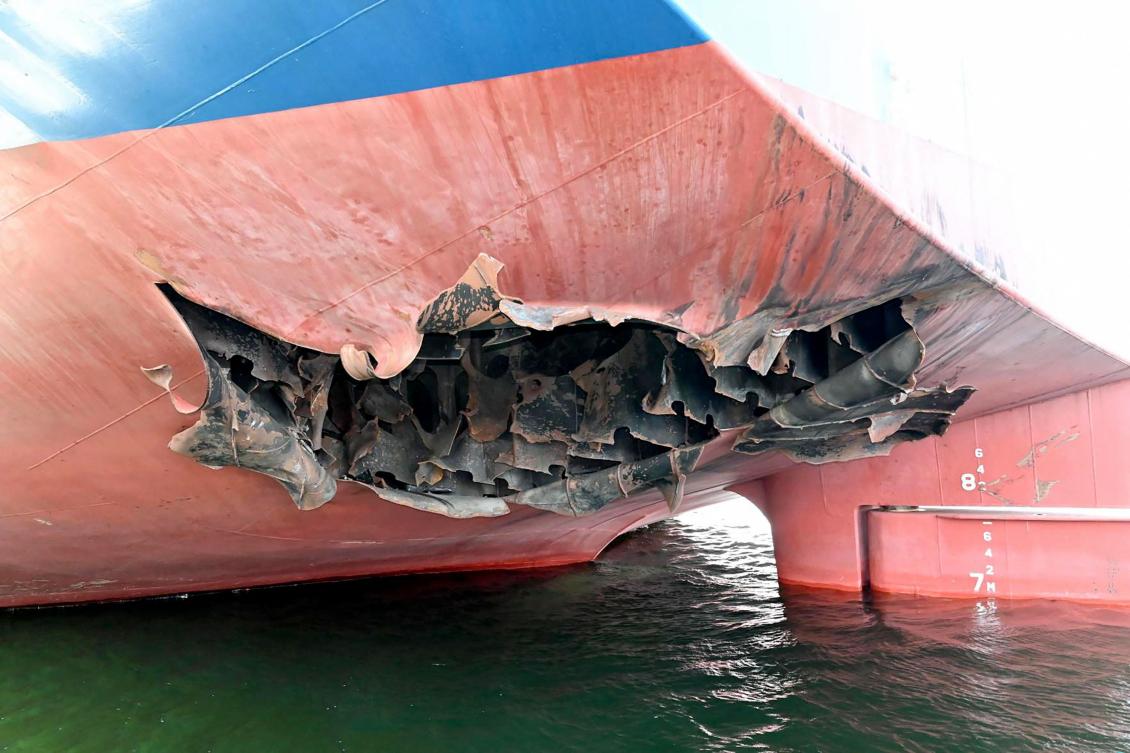 A South Korean cargo ship hit in the Strait of Hormuz six days ago was struck by unidentified aircraft, the foreign ministry in Seoul said on May 10, days after the fire-damaged HMM Namu arrived in Dubai. (FILE/AFP)