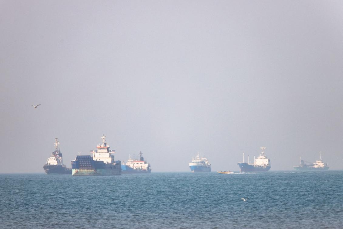 Above, ships in the Strait of Hormuz near Bandar Abbas, Iran on May 4, 2026. (WANA/Reuters)