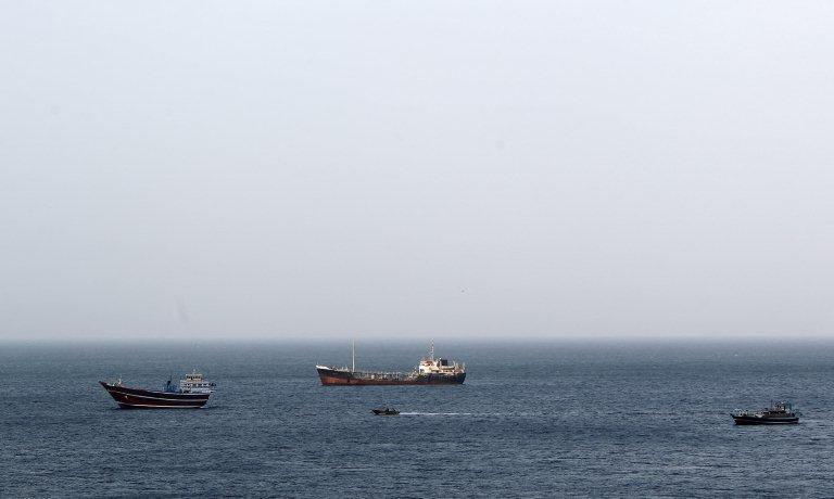 Dhows, fishing boats and cargo ships are seen in the Strait of Hormuz at Khasab area of Oman. (AFP file photo)