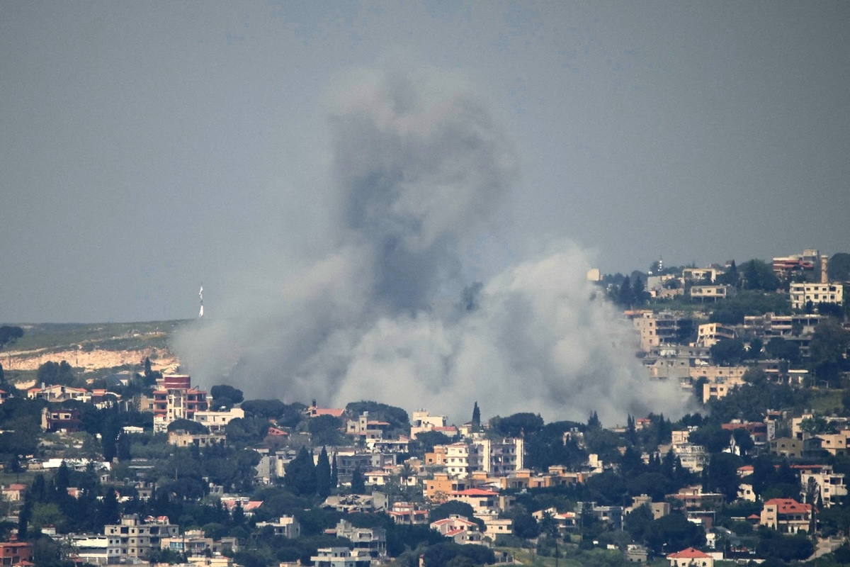 This photograph shows smoke rising from the site of an Israeli strike that targeted the village of Mayfadoun in southern Lebanon on May 9, 2026. (AFP)