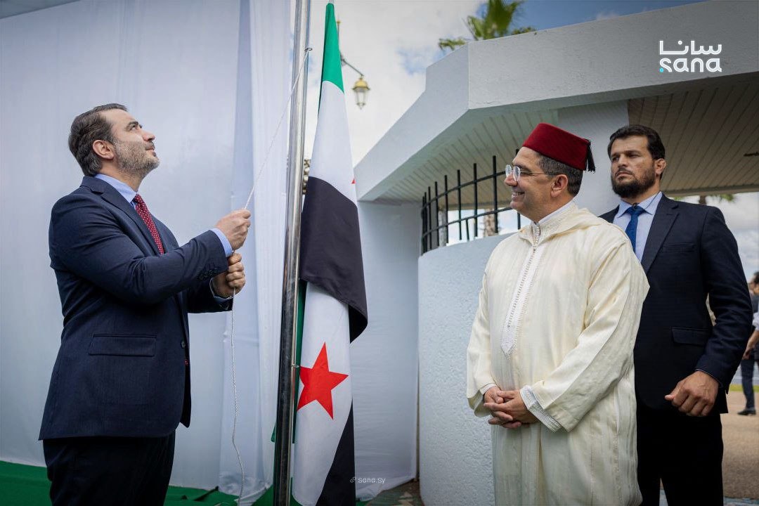 Asaad Hassan Al-Shaibani, Syria’s minister of foreign affairs and expatriates, raised his country’s flag over the embassy in the presence of his Moroccan counterpart, Nasser Bourita. (SANA)