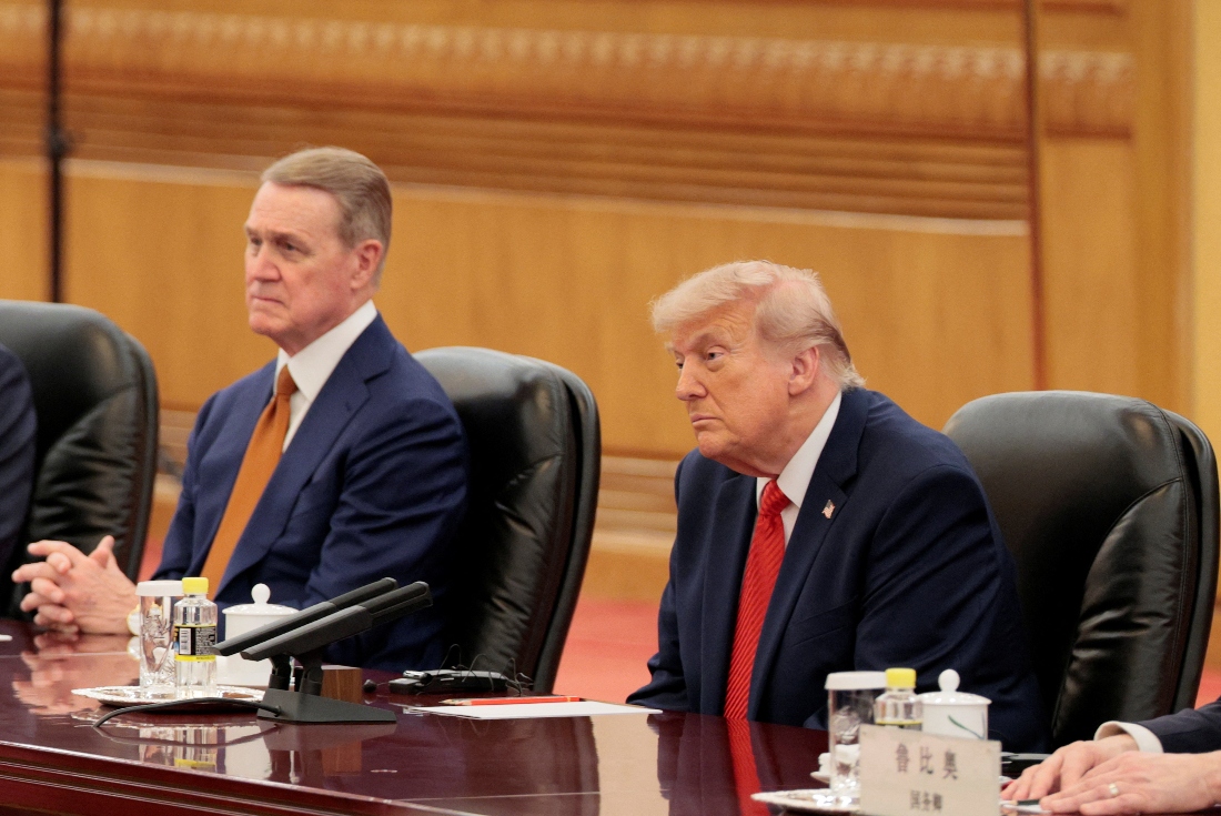 President Donald Trump and US Ambassador to China David Perdue participate in an expanded bilateral meeting at the Great Hall of the People in Beijing, China. (Reuters)