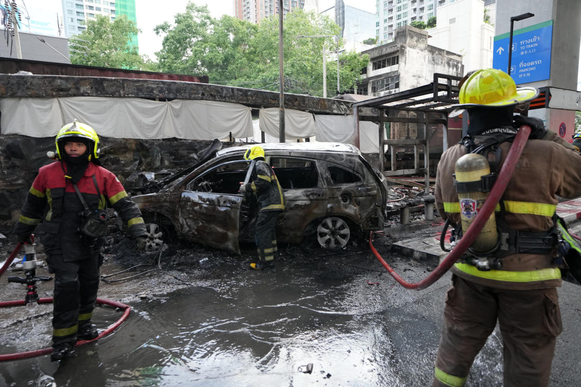 Rescuers work at a train crash site near an airport rail link station in Bangkok, May 16, 2026. (AP)