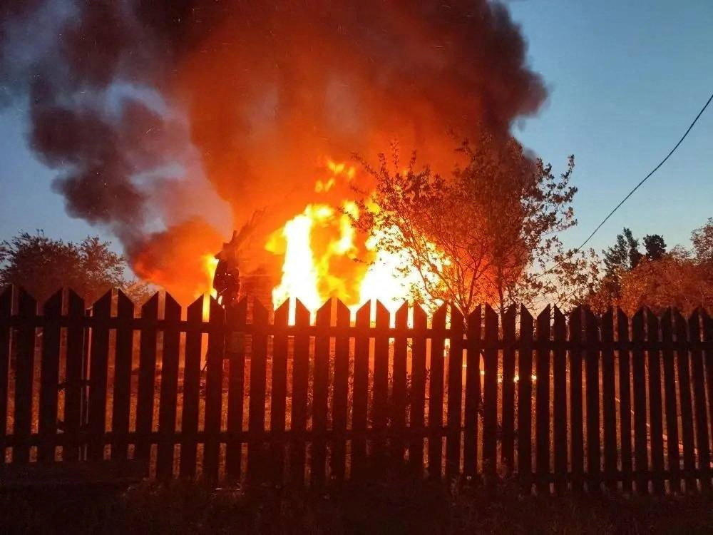 A house is on fire after a Ukrainian drone attack in the village of Subbotino, Naro-Fominsk District, in the Moscow region, Russia May 17, 2026. (Reuters)