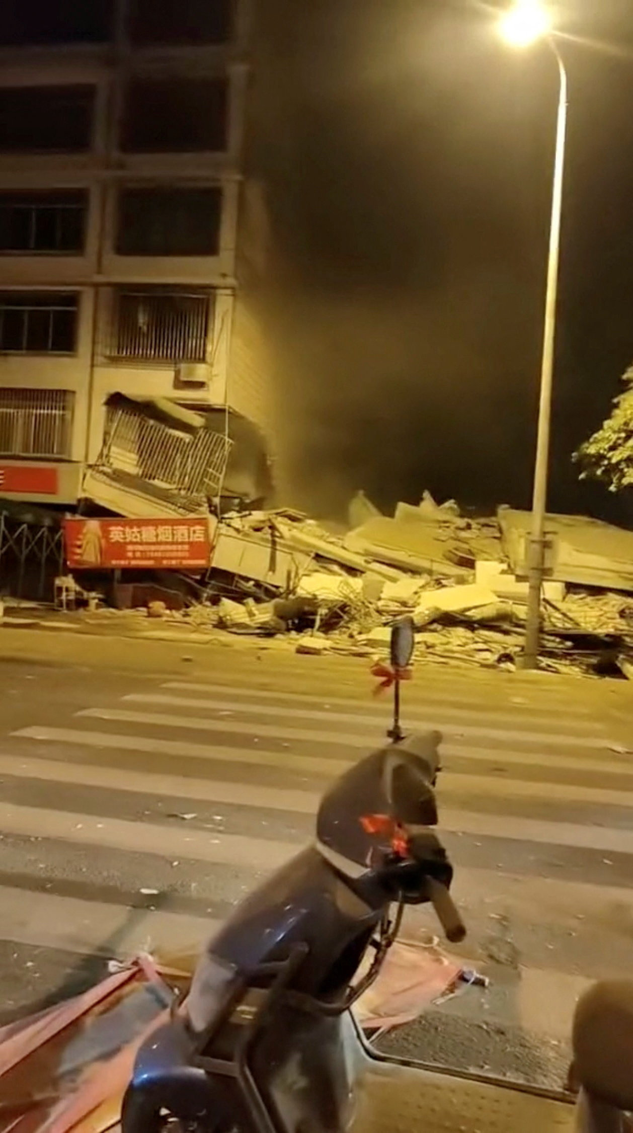 Dust rises from a damaged building following an earthquake at Taiyang village in Liuzhou, Guangxi Zhuang Autonomous Region, China, on May 18, 2026, in this screengrab obtained from a social media video. (REUTERS)