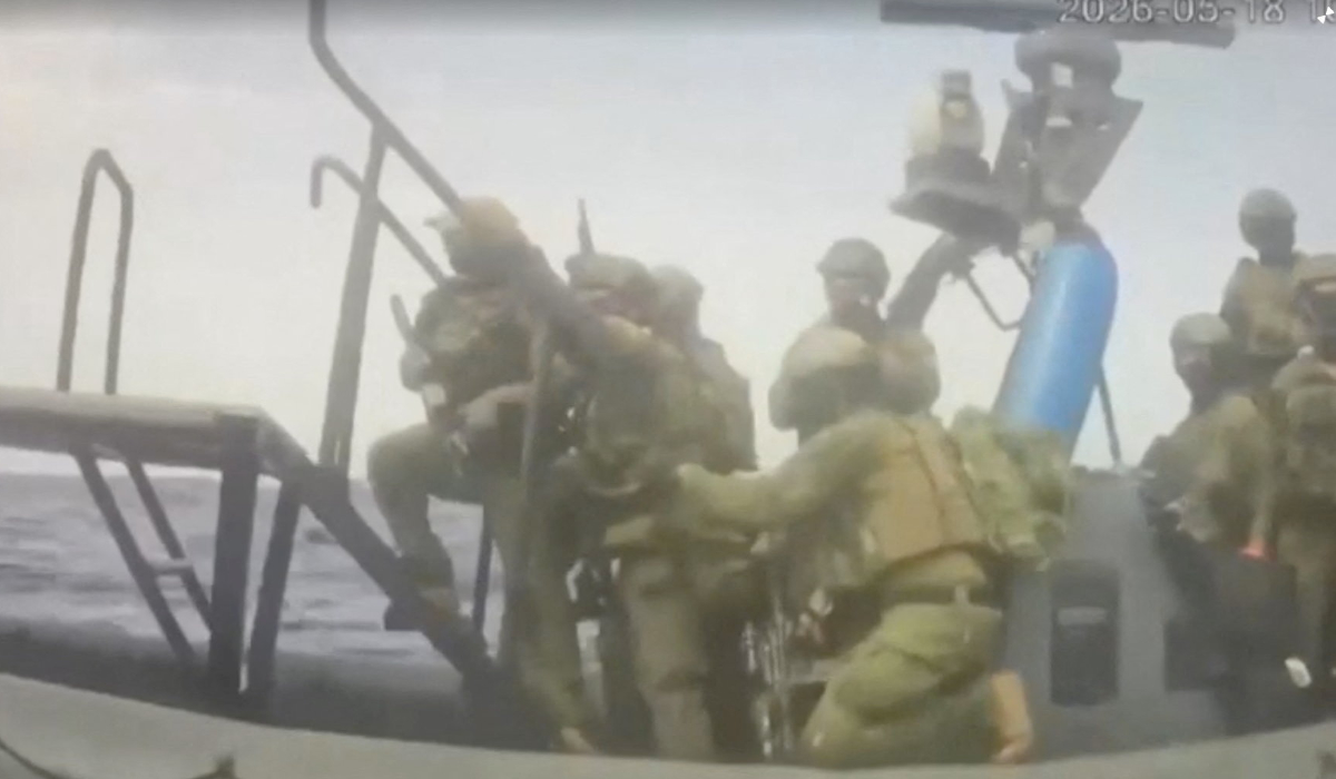An Israeli naval boat intercepts the Global Sumud Flotilla en route to Gaza, in an attempt to deliver aid, at sea May 18, 2026, in this screengrab taken from a handout video. (REUTERS)