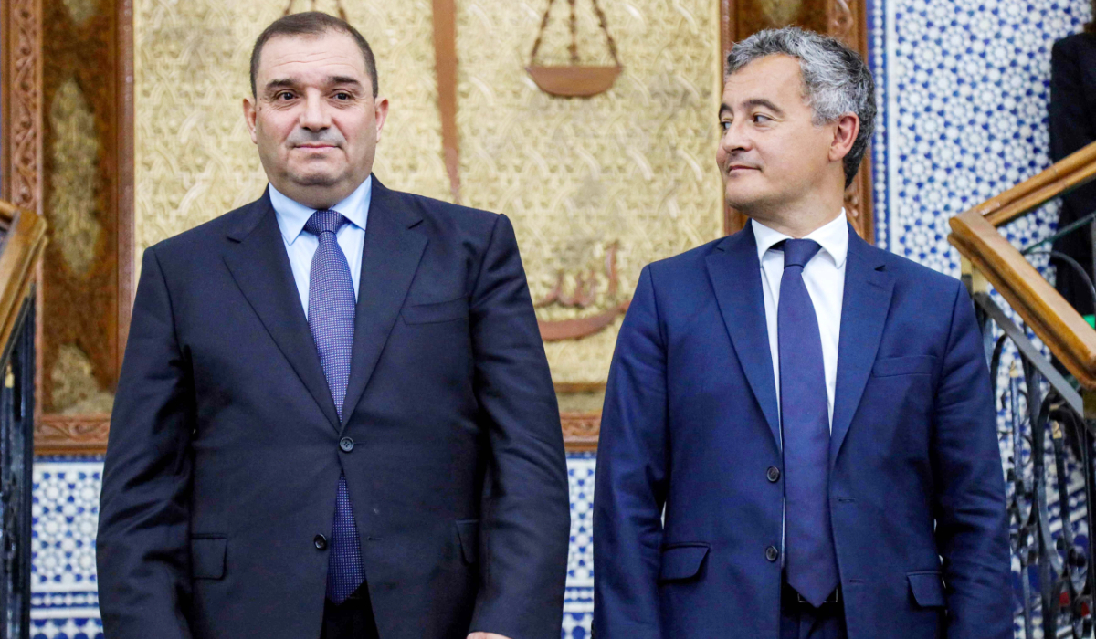 (L to R) Algeria's Justice Minister Lotfi Boudjemaa receives France's Justice Minister Gerald Darmanin during a bilateral meeting at the ministry headquarters in Algiers on May 18, 2026. (AFP)