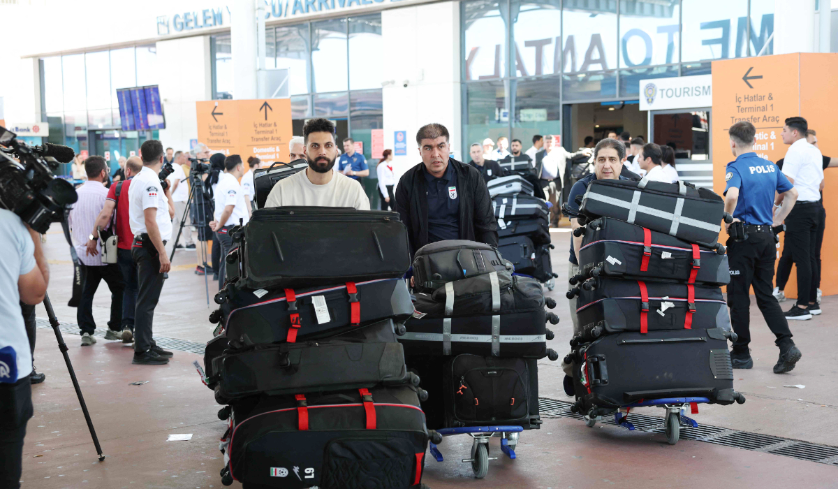 Members of the Iranian national football team exit a terminal following their arrival in Turkey ahead of their trip to the United States for the FIFA World Cup 2026, at Antalya airport in Antalya, southern Turkey, on May 18, 2026. (AFP)
