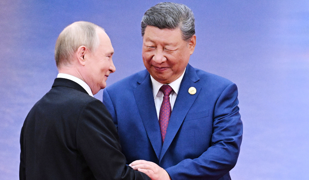 Russian President Vladimir Putin, left, and Chinese President Xi Jinping greet each other in Tianjin, China, on Aug. 31, 2025. (AP)