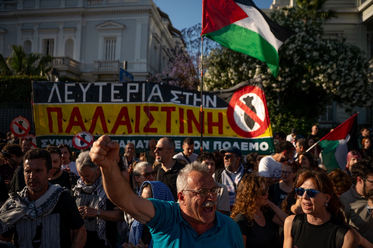 Protesters gathered in Greece outside the foreign ministry building in Athens in solidarity with the activists on board who include Greek nationals. (AFP)