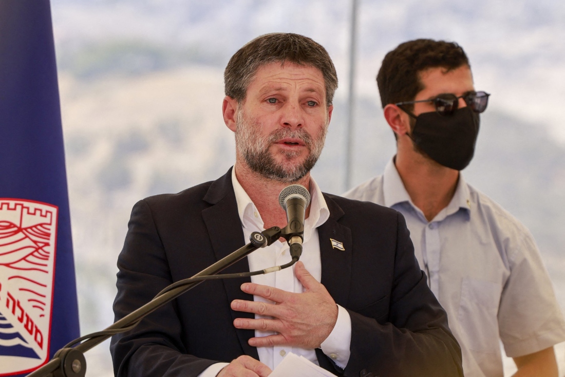 Israeli far-right Finance Minister Bezalel Smotrich speaks during a press conference near the settlement of Maale Adumim, in a land corridor known as E1, outside Jerusalem in the occupied West Bank. (AFP)