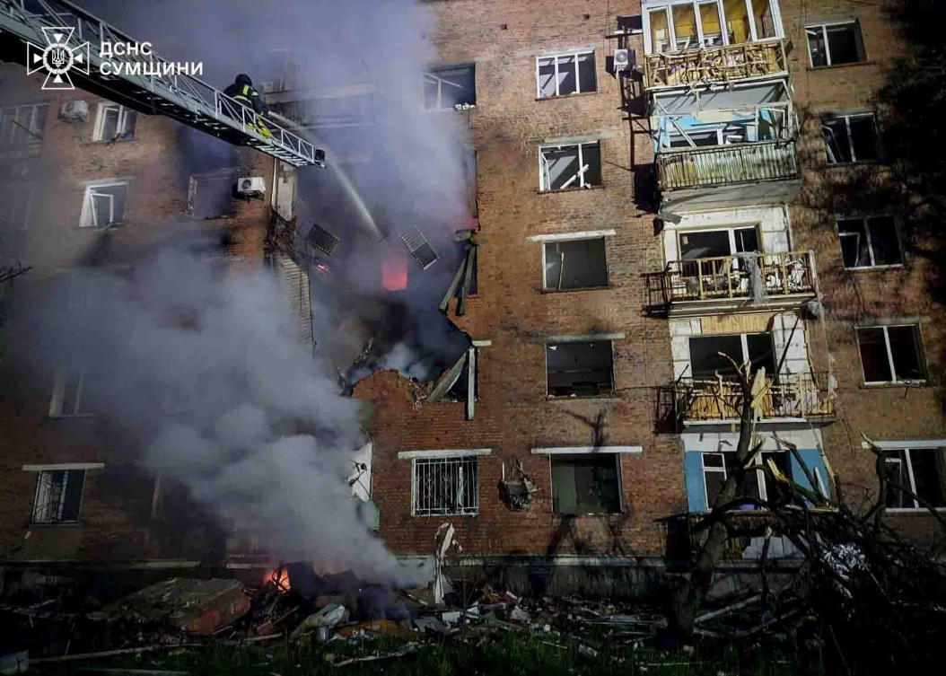 Ukrainian Emergency Services put out a fire of a residential building damaged after a Russian strike on Konotop, Ukraine on May 20, 2026. (Ukrainian Emergency Services via AP)