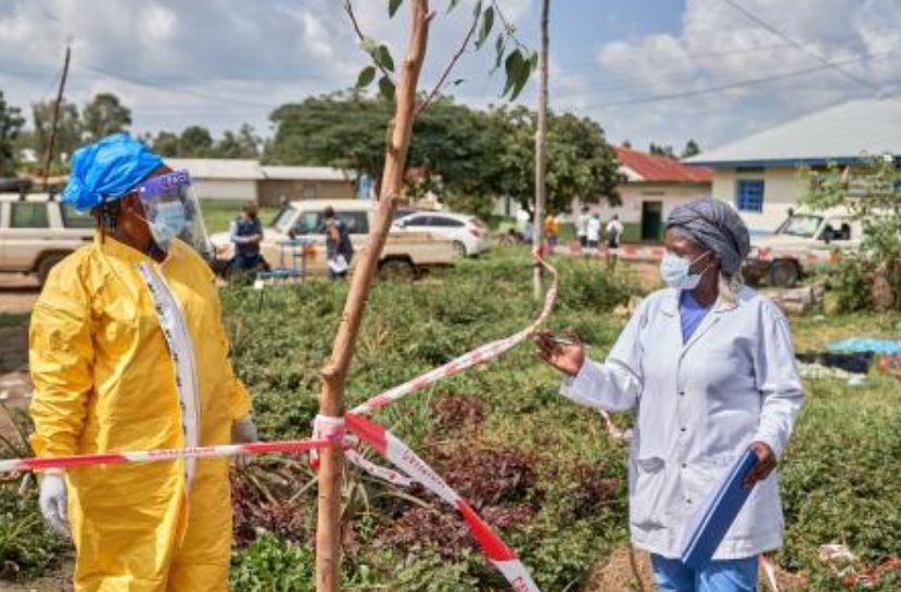 Health workers chat at an Ebola treatment center in Rwampara, Congo, May 19, 2026. (AP)