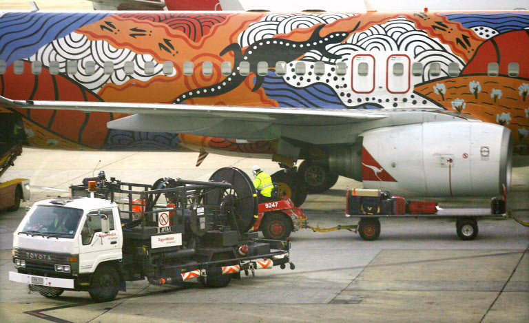 A refueling truck sits beside a Qantas jet in Melbourne, Australia, in this file photo. (AFP)