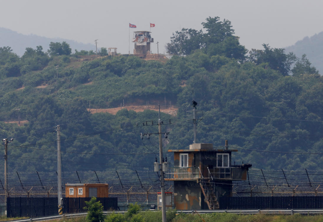 FILE PHOTO: A North Korean soldier stands guard at his guard post inside North Korean territory, in this picture taken from Paju, South Korea, near the demilitarized zone (DMZ) separating the two Koreas, June 17, 2020. REUTERS/Kim Hong-Ji/File Photo