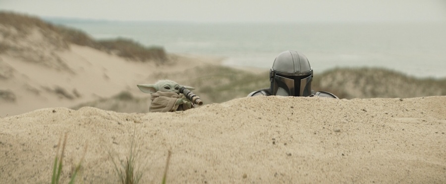 Pedro Pascal as the Mandalorian (right) and Grogu in ‘The Mandalorian and Grogu.’ (Supplied)