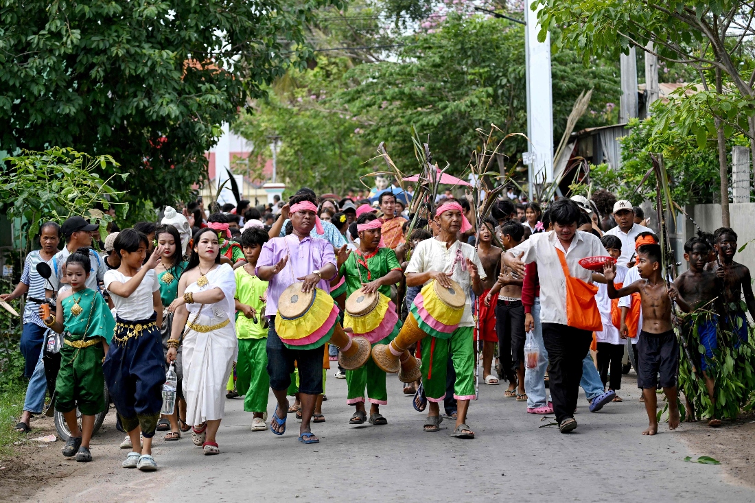 Cambodian villagers honor guardian spirits to pray for rain and good fortune