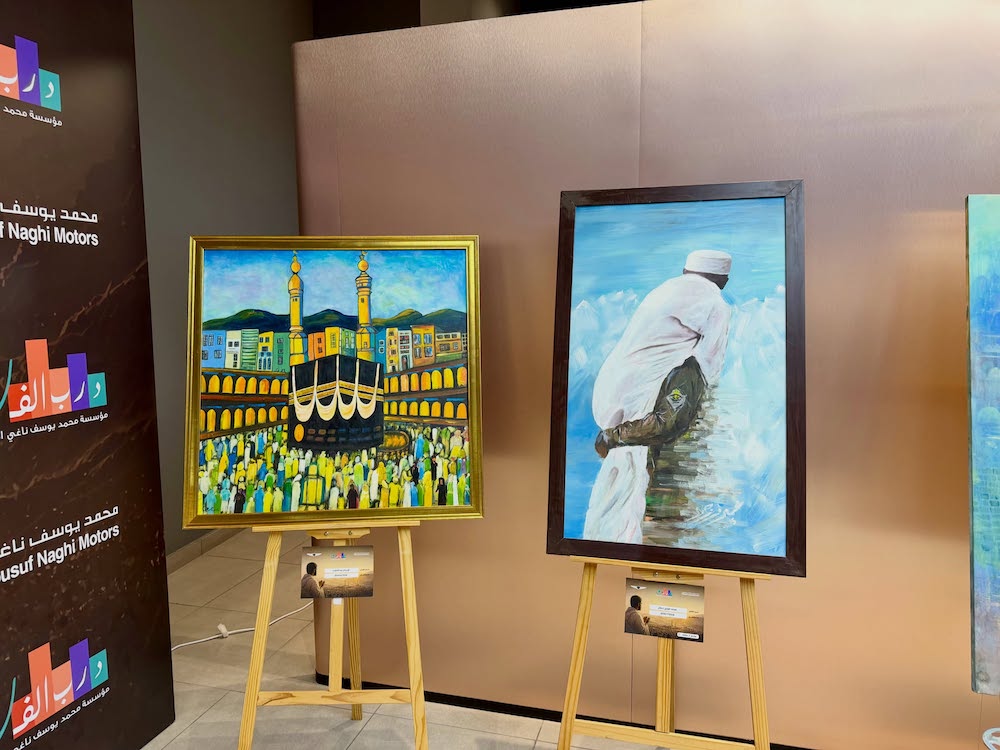 Saudi artists explore faith in Hajj exhibit held in car showroom