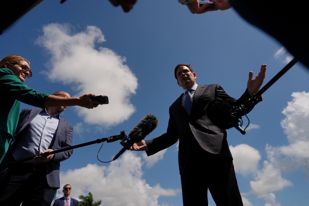 Secretary of State Marco Rubio speaks to the press before boarding his plane at Homestead Air Reserve Base. (Reuters)
