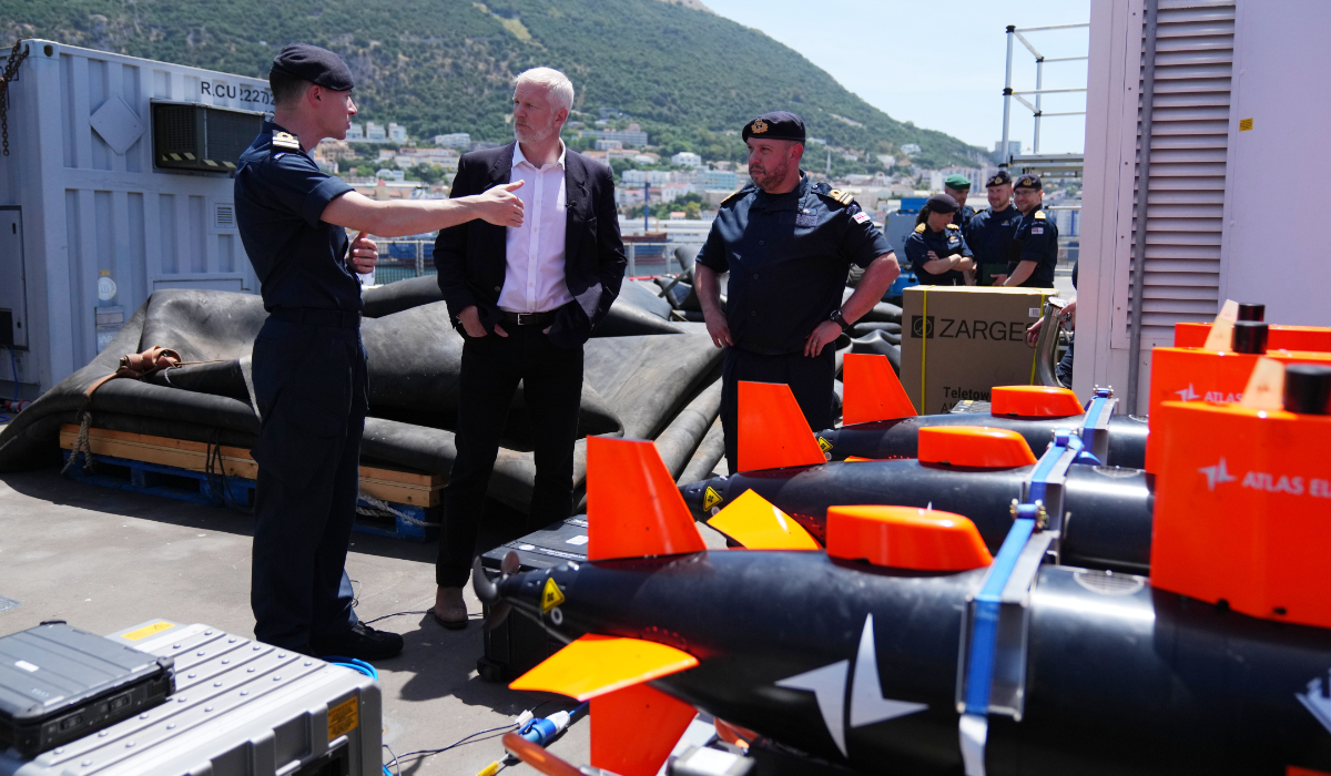 Britain's Armed Forces Minister Al Carns, centre, inspects autonomous vehicles with sonar sensor that can detect and identify mines, on RFA Lyme Bay in territory of Gibraltar, on Friday, May 22, 2026. (AP)