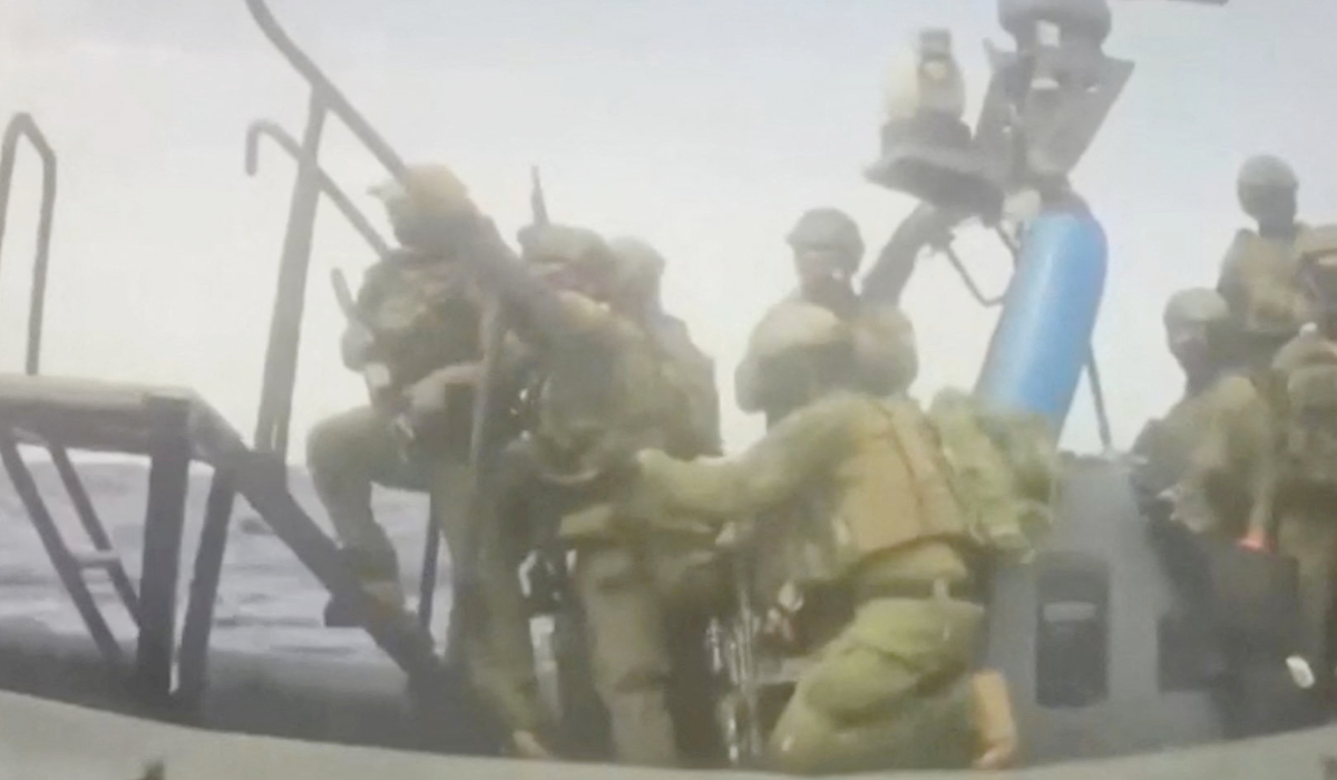 An Israeli naval boat intercepts the Global Sumud Flotilla en route to Gaza, in an attempt to deliver aid, at sea May 18, 2026, in this screengrab taken from a handout video. (REUTERS)