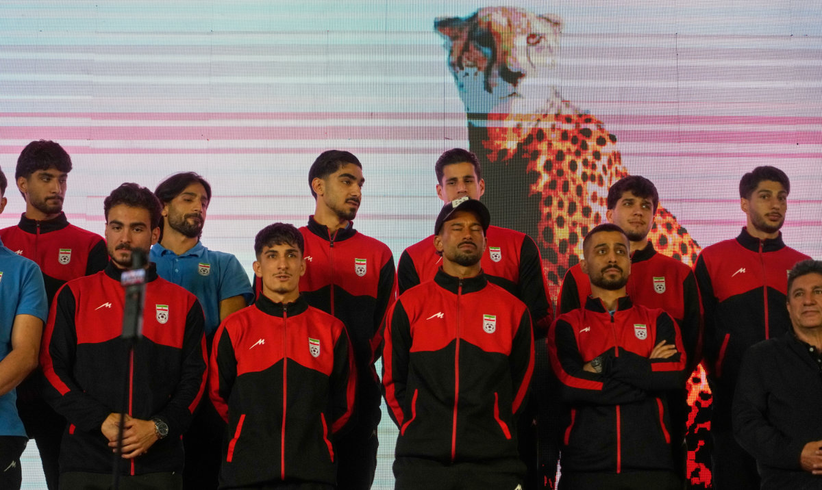 Iran’s national soccer team players stand onstage as they are greeted by a crowd during a pro-government gathering before their departure for training and friendly matches in Turkey ahead of the World Cup at Islamic Revolution Square in Tehran, Iran, Wednesday, May 13, 2026. (AP)