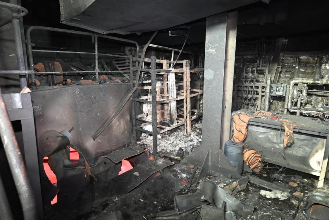 Above, the fire-damaged engine room of the South Korean cargo ship HMM Namu while docked at a port in Dubai. (AFP)