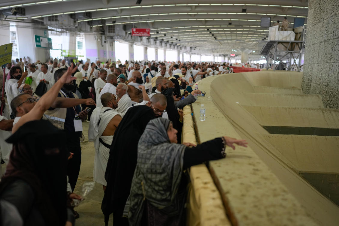 Muslim pilgrims pray after they cast pebbles at pillars in the symbolic stoning of the devil, the last rite of the annual Hajj, in Mina near the holy city of Makkah on May 27, 2026. (AP)
