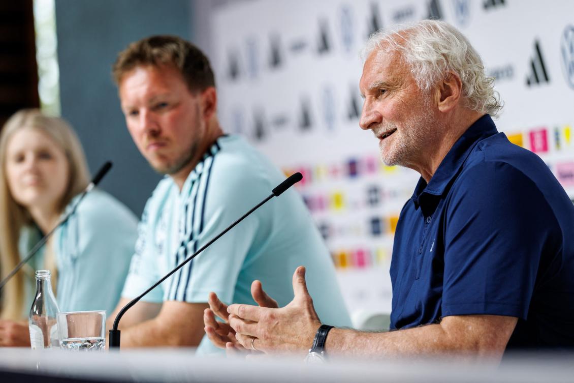 Germany’s head coach Julian Nagelsmann and Rudi Voeller, Sporting director of the German national team addresses a press conference on May 27, 2026 in Herzogenaurach, southern Germany, ahead of their pre-World Cup friendly match against Finland. (AFP)
