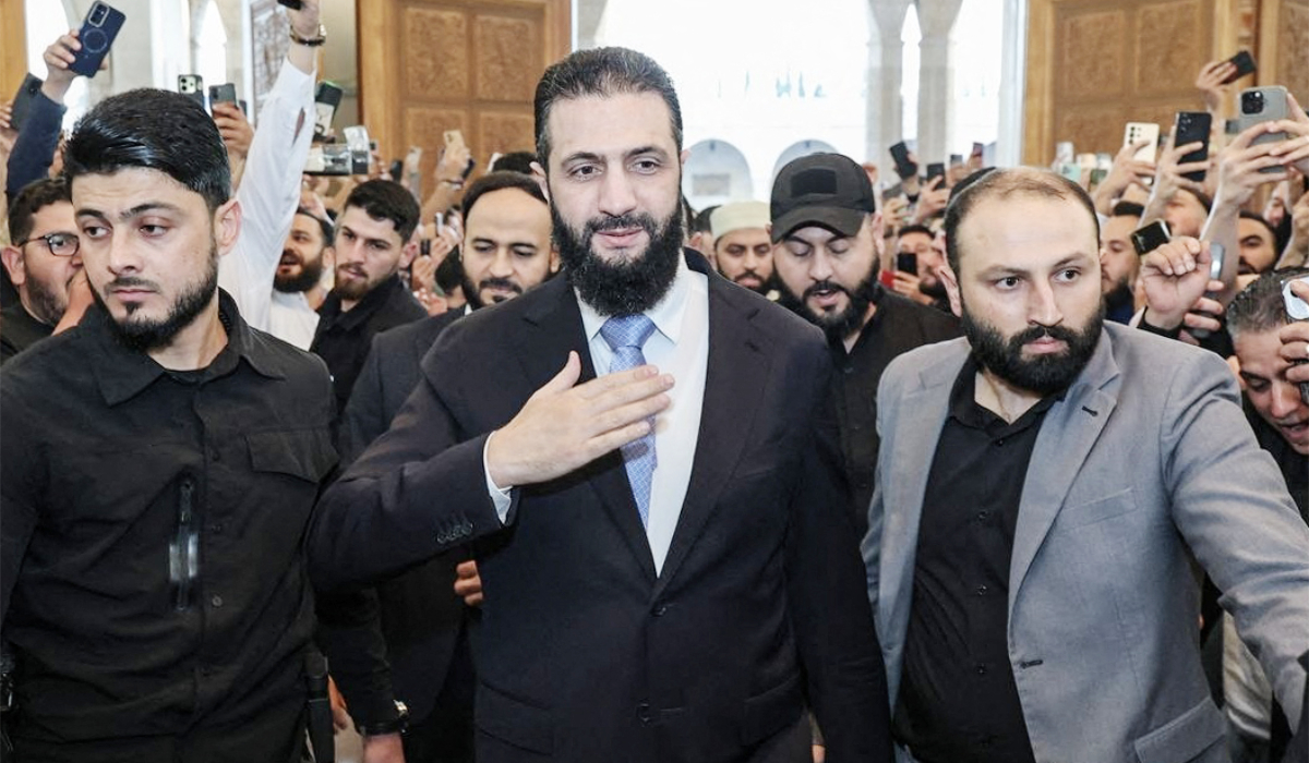 Syria's President Ahmed al-Sharaa arriving to perform morning prayers marking the start of Eid al-Adha, the Feast of Sacrifice, at the Abdullah bin Abbas Mosque in Aleppo on May 27, 2026. (AFP)