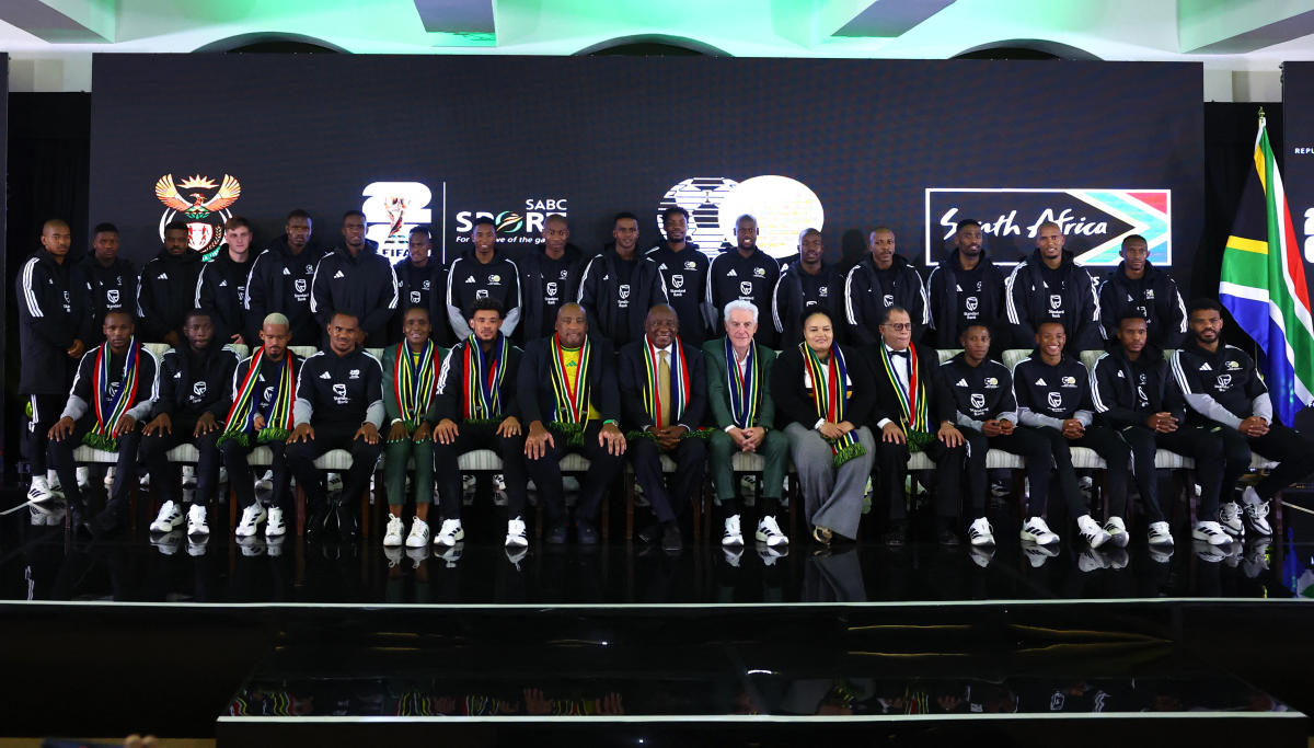 South Africa coach Hugo Broos, president Cyril Ramaphosa and football association president Danny Jordaan with the squad during the announcement of their World Cup 2026 squad at Sefako Makgatho Presidential Guest House, Pretoria, on May 27, 2026 (Reuters)