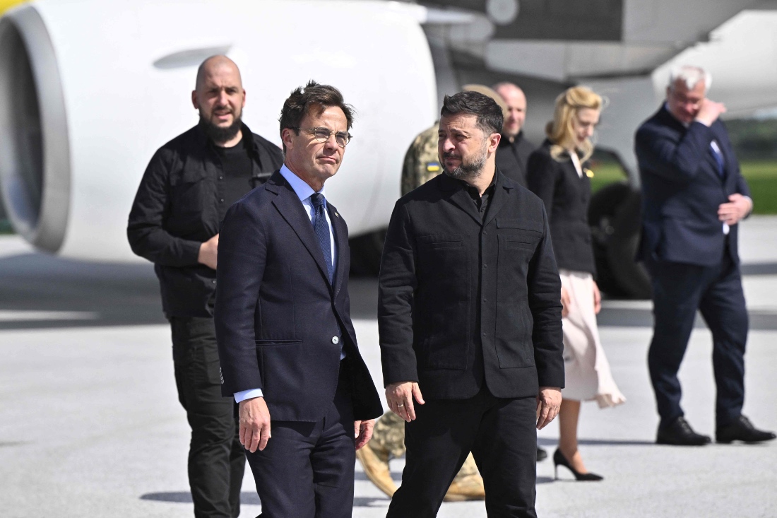 Ukraine's President Volodymyr Zelensky is greeted by Swedish Prime Minister Ulf Kristersson at the F16 air flotilla in Uppsala, Sweden. (AFP)