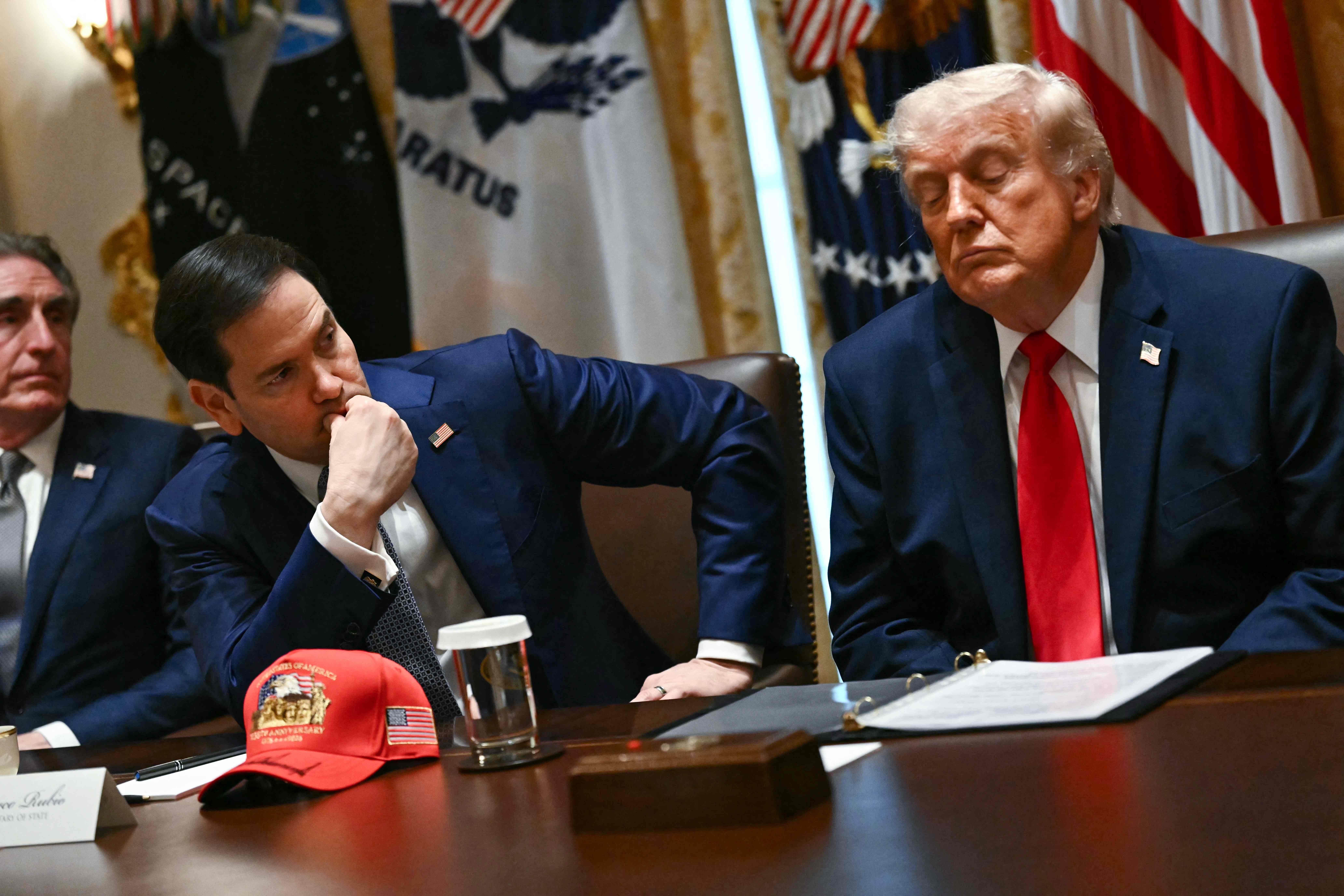 US Secretary of State Marco Rubio (L) and US President Donald Trump listen during a cabinet meeting in the Cabinet Room of the White House in Washington on May 27, 2026. (AFP)