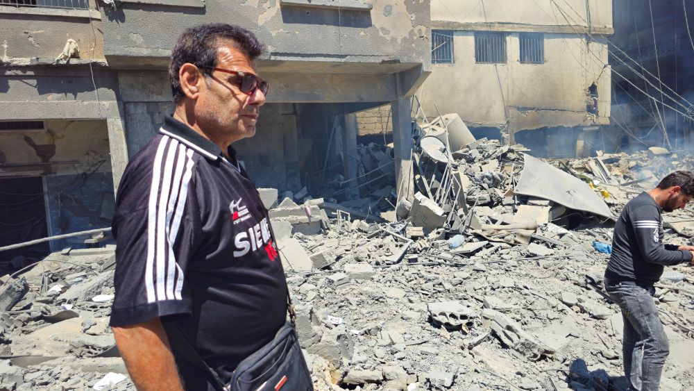 People inspect the site of an Israeli strike in Tyre, Lebanon, May 28, 2026. (Reuters)